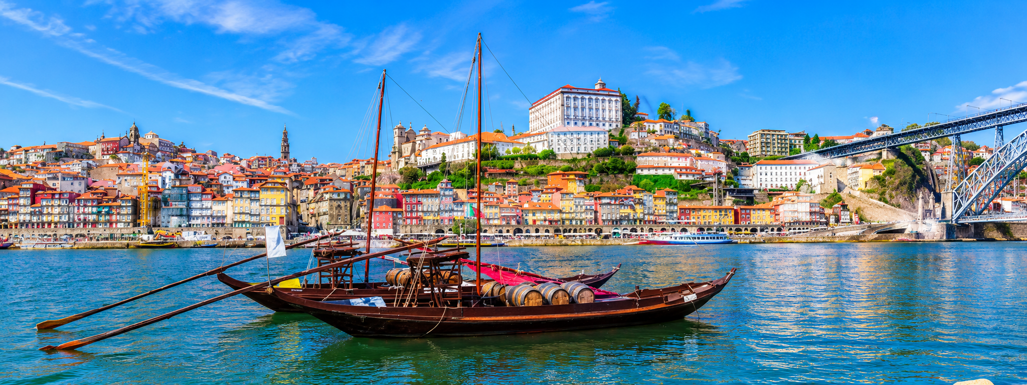 Séminaire à Porto : bateau traditionnel sur le Douro et panorama de la ville